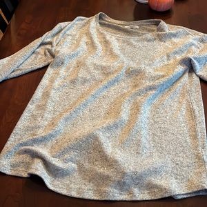 Maurice’s grey sweater with rhinestones